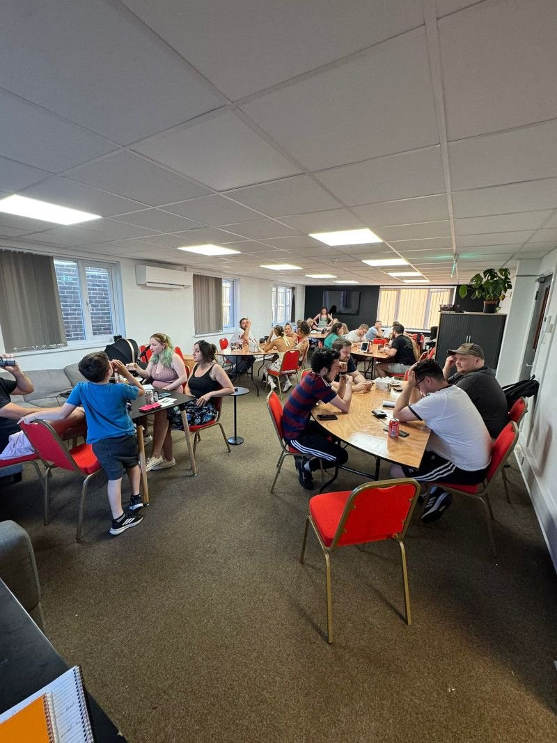 Playground's lounge area featuring a 65inch TV